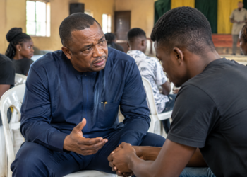 Anambra youth-rehabilitation meeting with a state official and young adult